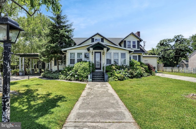 6126 Taylor St, Chincoteague Island, VA 23336 - view of front facade with a chimney