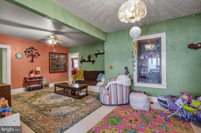 6126 Taylor St, Chincoteague Island, VA 23336 - living room with a textured wall, a textured ceiling, and ceiling fan