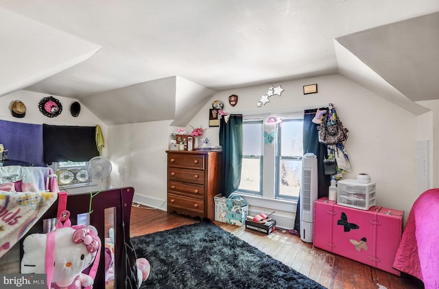 6126 Taylor St, Chincoteague Island, VA 23336 - bedroom featuring vaulted ceiling and wood-type flooring