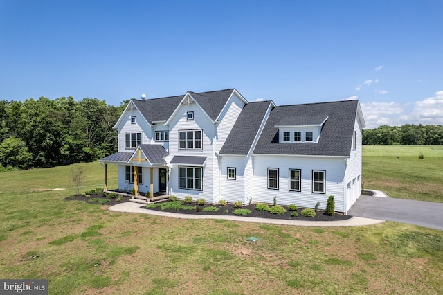 3471 Bullfrog Rd, Taneytown, MD 21787 - view of front of property featuring asphalt driveway, a porch, a front lawn, and an attached garage