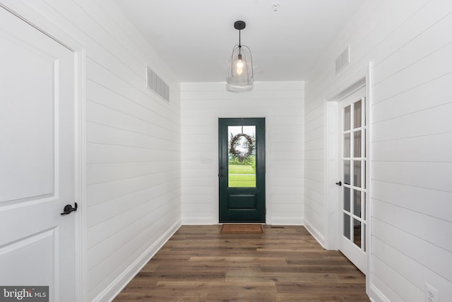 3471 Bullfrog Rd, Taneytown, MD 21787 - foyer entrance with dark wood-style floors and wooden walls