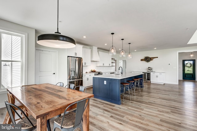 3471 Bullfrog Rd, Taneytown, MD 21787 - dining area featuring beverage cooler, light wood-style floors, recessed lighting, and baseboards