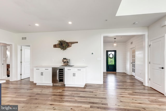 3471 Bullfrog Rd, Taneytown, MD 21787 - indoor dry bar with beverage cooler, light wood-type flooring, baseboards, and recessed lighting