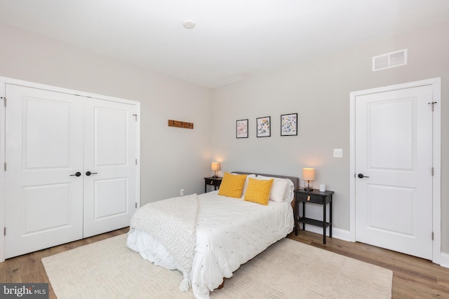 3471 Bullfrog Rd, Taneytown, MD 21787 - bedroom with wood finished floors, a closet, and baseboards