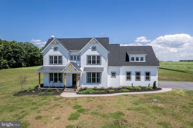 3471 Bullfrog Rd, Taneytown, MD 21787 - modern inspired farmhouse with covered porch, a front lawn, a shingled roof, a standing seam roof, and metal roof