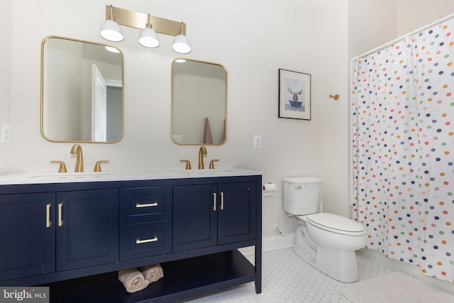 3471 Bullfrog Rd, Taneytown, MD 21787 - bathroom featuring toilet, double vanity, a shower with shower curtain, and baseboards