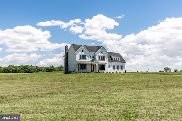 3471 Bullfrog Rd, Taneytown, MD 21787 - view of front facade featuring a front yard, a chimney, and a view of countryside
