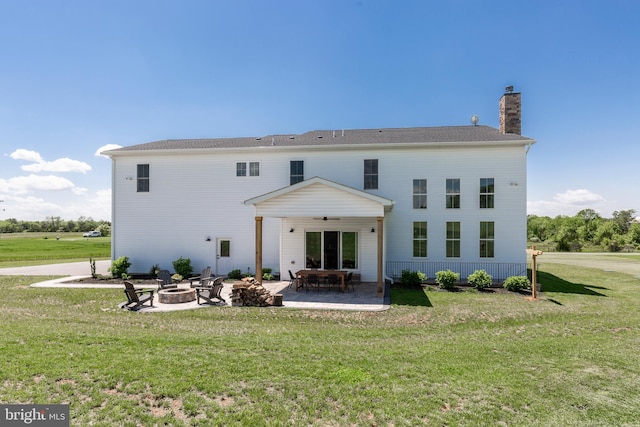 3471 Bullfrog Rd, Taneytown, MD 21787 - back of house featuring an outdoor fire pit, a patio area, a yard, ceiling fan, and a chimney