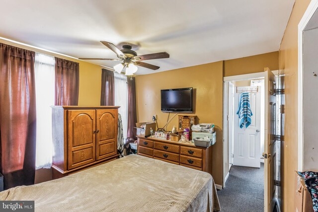 1059 N 32nd St, Camden, NJ 08105 - bedroom featuring dark carpet and a ceiling fan
