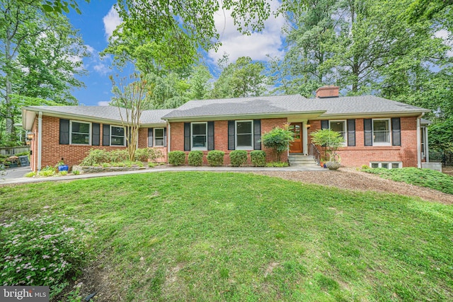 3404 Rustic Way Ln, Falls Church, VA 22044 - single story home with a front yard, brick siding, and a chimney