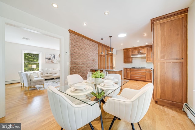 3404 Rustic Way Ln, Falls Church, VA 22044 - dining space with a baseboard heating unit, light wood-style floors, a baseboard radiator, and recessed lighting