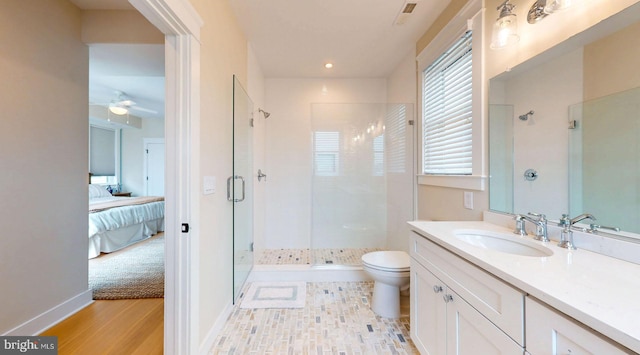 625 Bay Ave, Ocean City, NJ 08226 - ensuite bathroom with a shower stall, toilet, ceiling fan, vanity, and recessed lighting