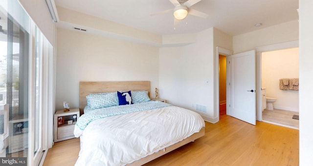 625 Bay Ave, Ocean City, NJ 08226 - bedroom with wood finished floors, baseboards, connected bathroom, and a ceiling fan