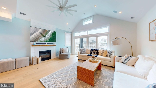 625 Bay Ave, Ocean City, NJ 08226 - living room with ceiling fan, wood finished floors, a glass covered fireplace, recessed lighting, and high vaulted ceiling