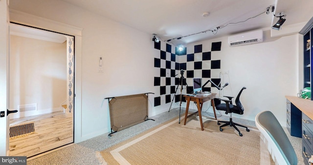 625 Bay Ave, Ocean City, NJ 08226 - office area featuring an AC wall unit, baseboards, and rail lighting