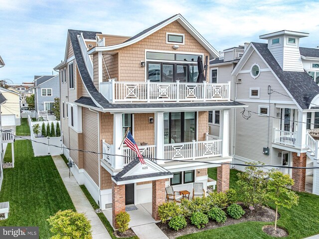 625 Bay Ave, Ocean City, NJ 08226 - view of front of home with a balcony and roof with shingles