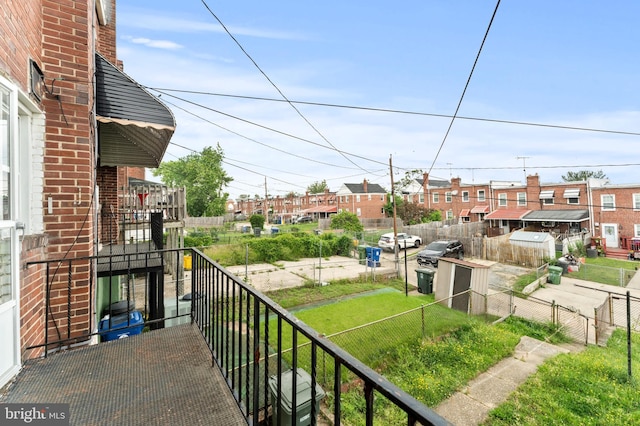 balcony featuring a residential view