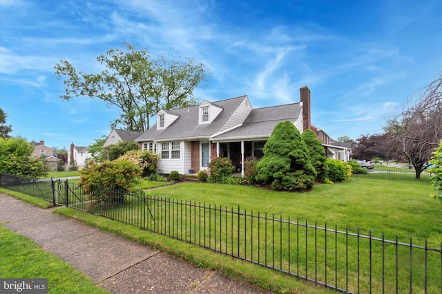 cape cod home with a chimney and brick siding