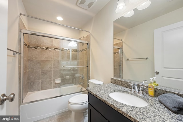 43008 Paris Gap Sq, Ashburn, VA 20148 - bathroom with toilet, vanity, and combined bath / shower with glass door