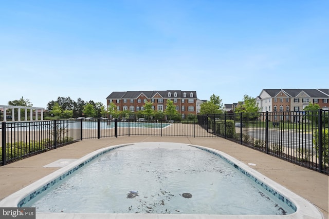 43008 Paris Gap Sq, Ashburn, VA 20148 - community pool featuring fence, a residential view, and a patio area