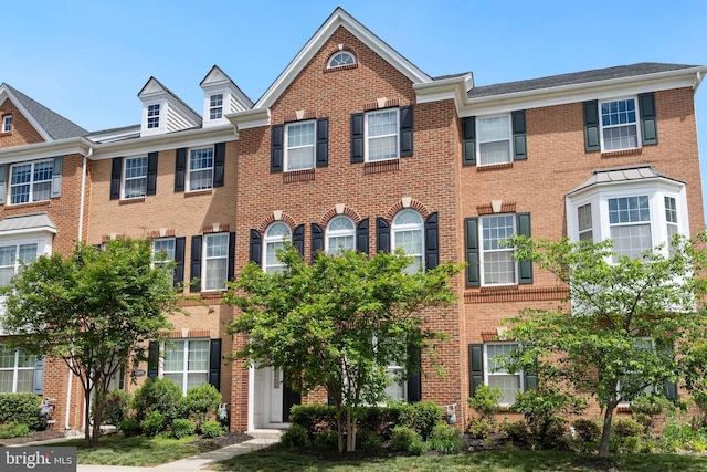 43008 Paris Gap Sq, Ashburn, VA 20148 - view of property featuring brick siding
