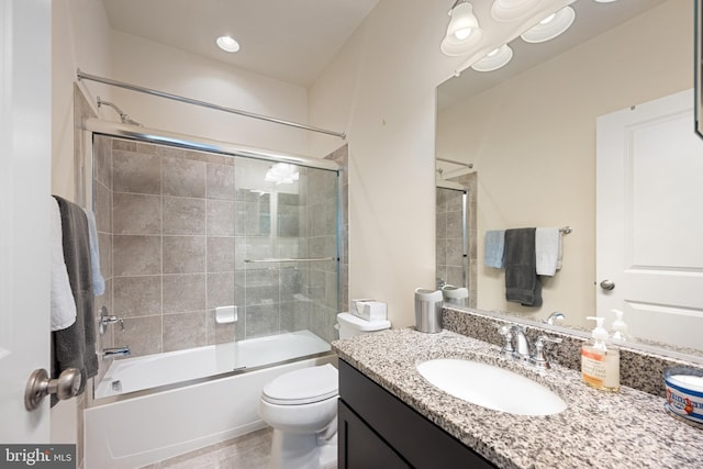 43008 Paris Gap Sq, Ashburn, VA 20148 - bathroom with toilet, vanity, and enclosed tub / shower combo