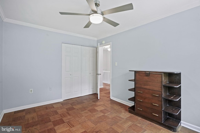 865 Azalea Dr Unit 26-865, Rockville, MD 20850 - unfurnished bedroom featuring crown molding, a closet, baseboards, and a ceiling fan