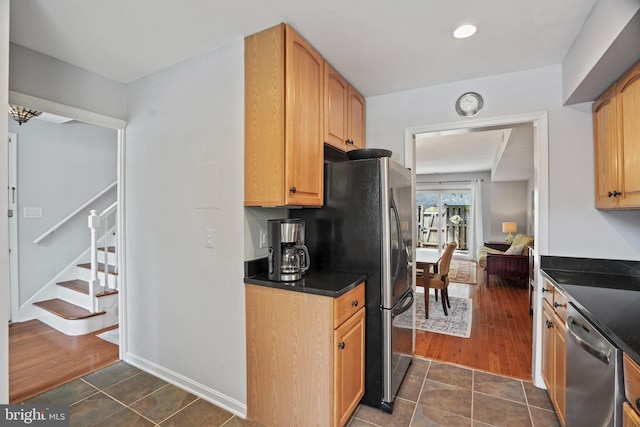 865 Azalea Dr Unit 26-865, Rockville, MD 20850 - kitchen featuring appliances with stainless steel finishes, dark countertops, dark tile patterned flooring, and recessed lighting