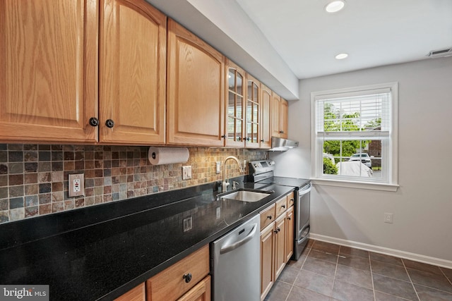 865 Azalea Dr Unit 26-865, Rockville, MD 20850 - kitchen with a sink, stainless steel appliances, backsplash, tile patterned flooring, and baseboards