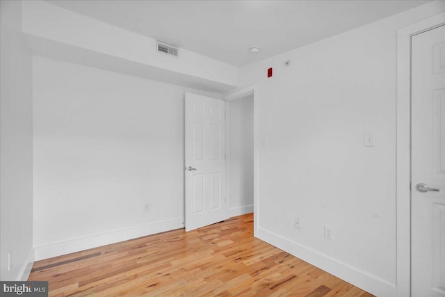 1014 N 4th St, Philadelphia, PA 19123 - empty room featuring light wood-style floors, baseboards, and a smoke detector