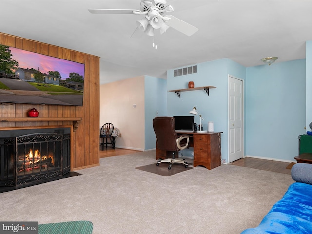 3357 Old Line Ave, Laurel, MD 20724 - carpeted office space featuring a ceiling fan, baseboards, and a fireplace with flush hearth