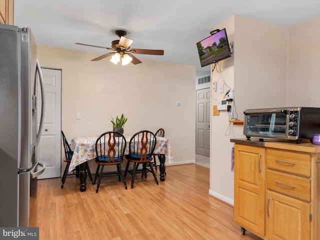 3357 Old Line Ave, Laurel, MD 20724 - dining area featuring a ceiling fan, light wood-style floors, and baseboards
