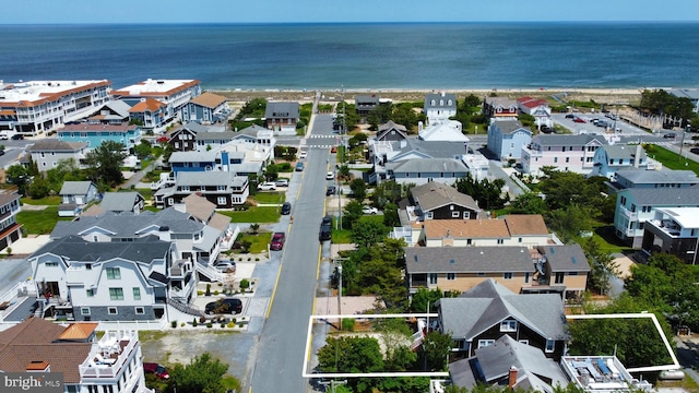 118 Parkwood St, Bethany Beach, DE 19930 - aerial overview of property's location with expansive coastline, nearby suburban area, and property parcel outlined