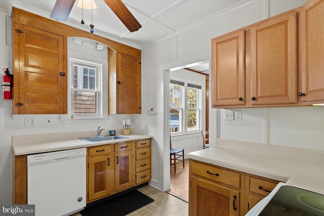 118 Parkwood St, Bethany Beach, DE 19930 - kitchen featuring white dishwasher, a sink, light countertops, and light flooring