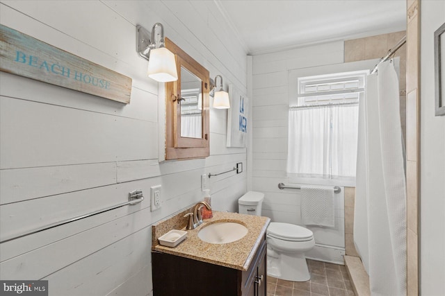 118 Parkwood St, Bethany Beach, DE 19930 - full bath featuring toilet, vanity, crown molding, curtained shower, and wooden walls