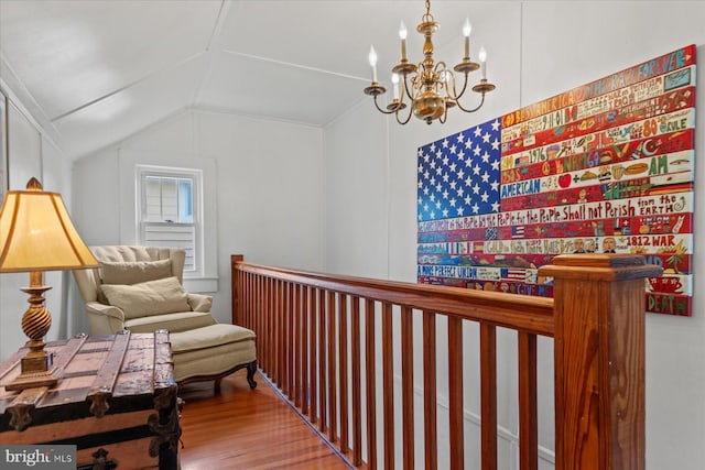 118 Parkwood St, Bethany Beach, DE 19930 - sitting room with a chandelier, wood finished floors, and vaulted ceiling