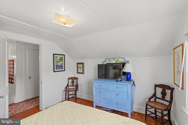118 Parkwood St, Bethany Beach, DE 19930 - bedroom with vaulted ceiling and wood finished floors