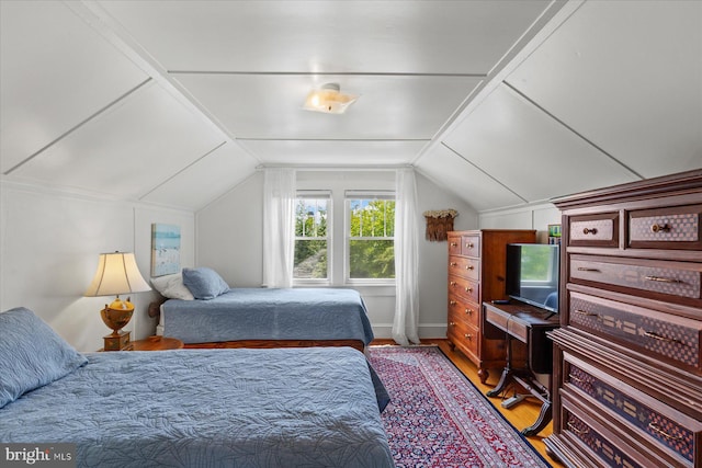 118 Parkwood St, Bethany Beach, DE 19930 - bedroom featuring wood finished floors and lofted ceiling