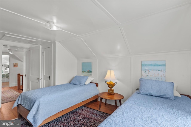 118 Parkwood St, Bethany Beach, DE 19930 - bedroom featuring wood finished floors and vaulted ceiling