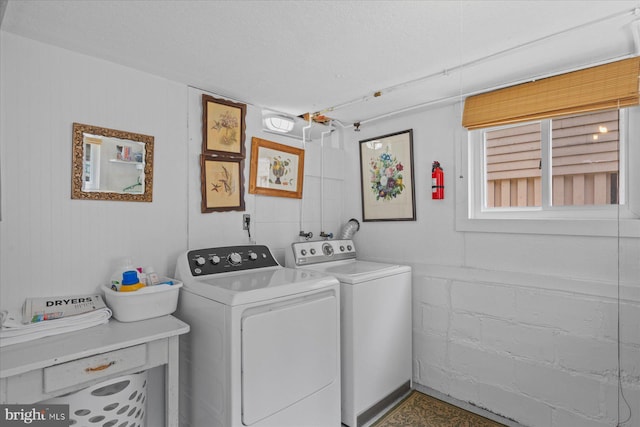 118 Parkwood St, Bethany Beach, DE 19930 - laundry room featuring separate washer and dryer and concrete block wall