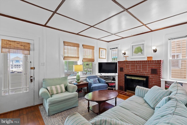 118 Parkwood St, Bethany Beach, DE 19930 - living area featuring hardwood / wood-style flooring, healthy amount of natural light, and a fireplace