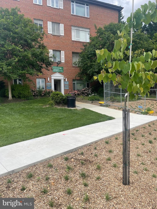 surrounding community with a yard