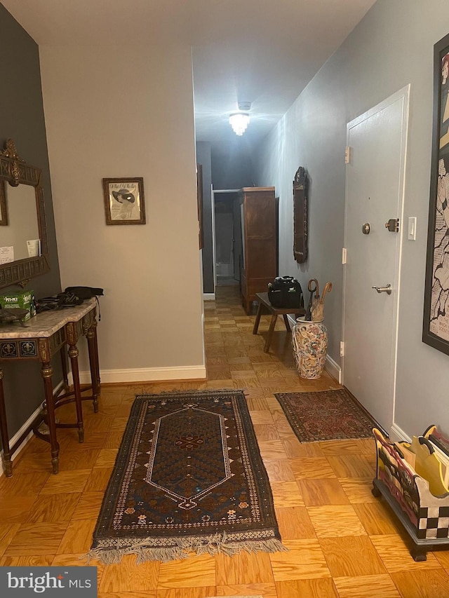 corridor with baseboards