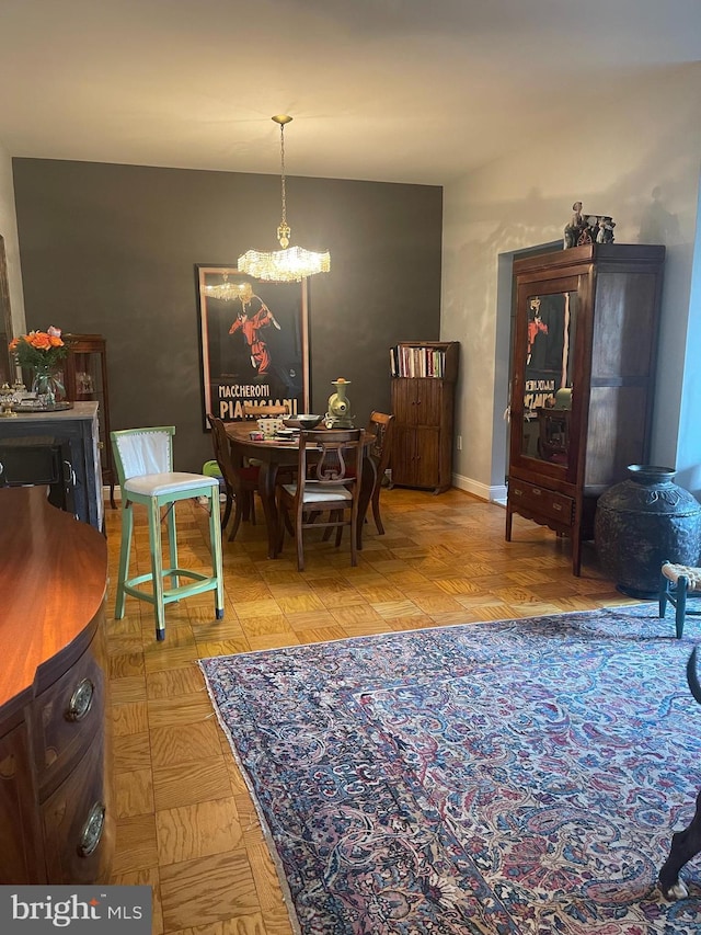 dining room with a chandelier