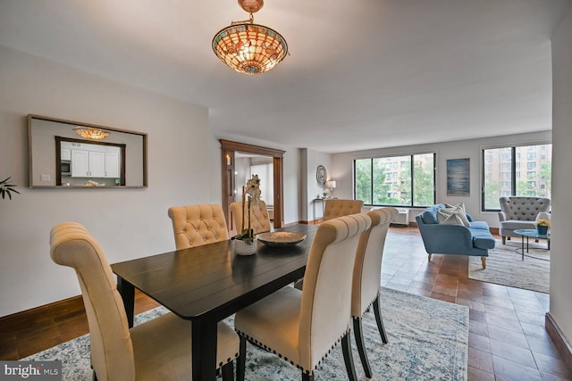 2501 Calvert St NW Unit 306, Washington, DC 20008 - dining room with baseboards