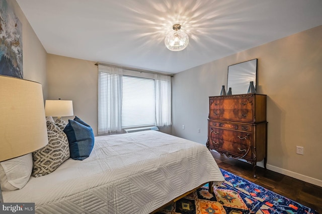 2501 Calvert St NW Unit 306, Washington, DC 20008 - bedroom featuring wood finished floors and baseboards