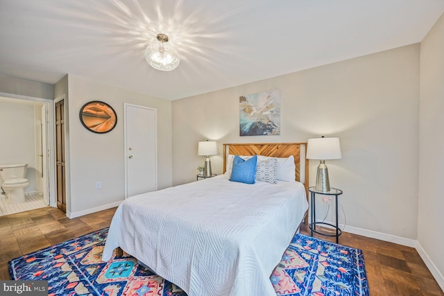 2501 Calvert St NW Unit 306, Washington, DC 20008 - bedroom featuring baseboards and ensuite bath