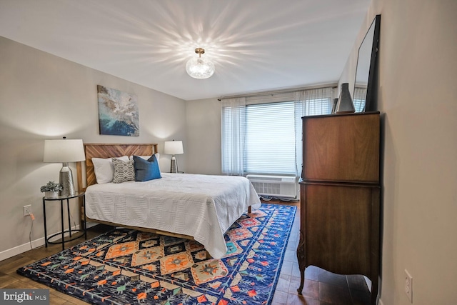 2501 Calvert St NW Unit 306, Washington, DC 20008 - bedroom featuring baseboards and cooling unit