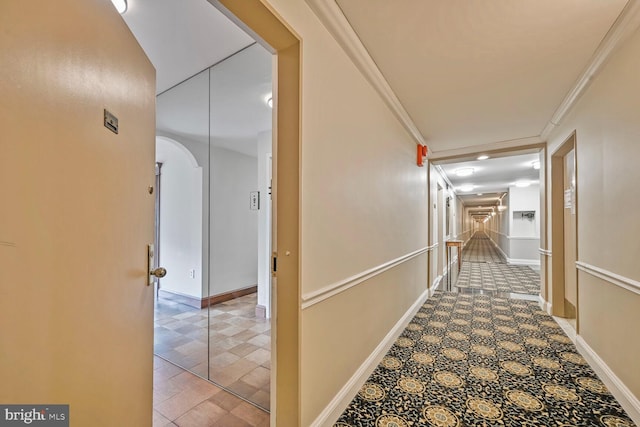 2501 Calvert St NW Unit 306, Washington, DC 20008 - hallway featuring arched walkways and baseboards