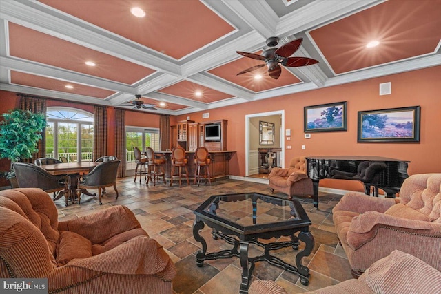 217 Rising Meadow Way E, Stroudsburg, PA 18302 - living area featuring a ceiling fan, stone tile floors, coffered ceiling, baseboards, and beam ceiling